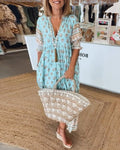 MANA | ROBE FLORALE CHIC MI-LONGUE AVEC ENCOLURE EN V