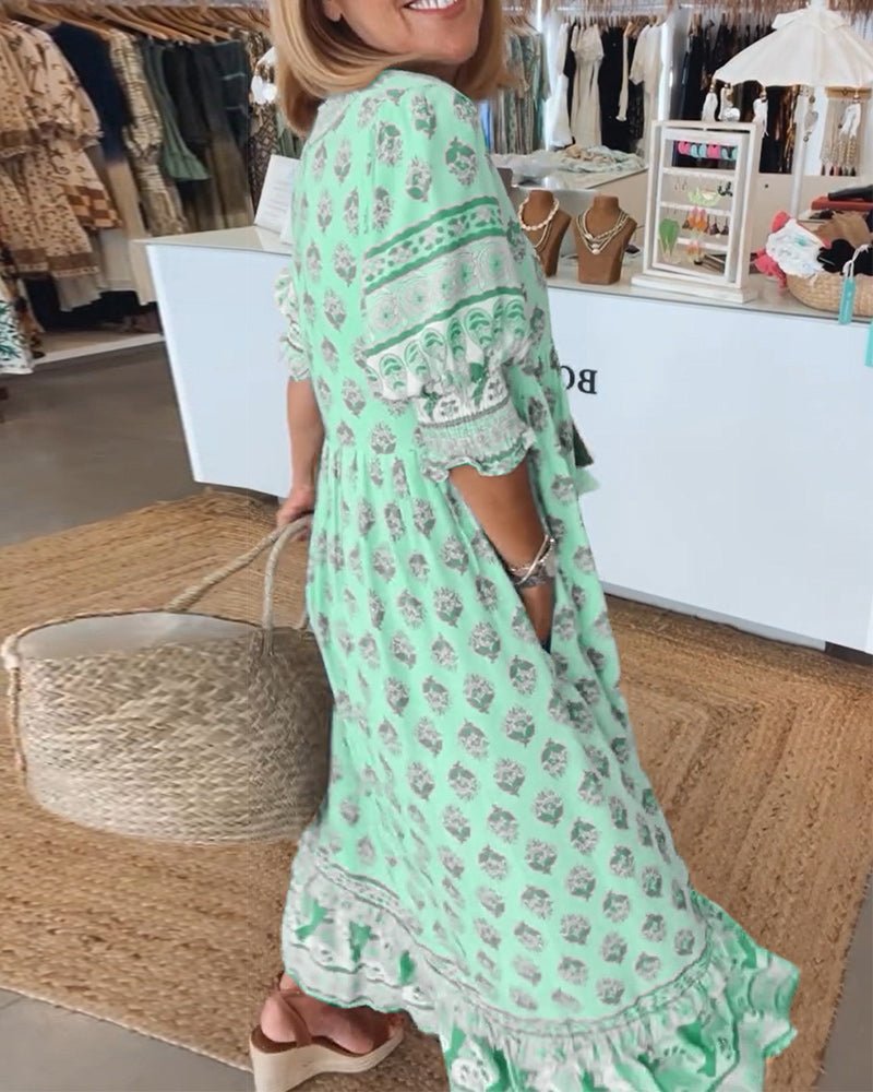 MANA | ROBE FLORALE CHIC MI-LONGUE AVEC ENCOLURE EN V