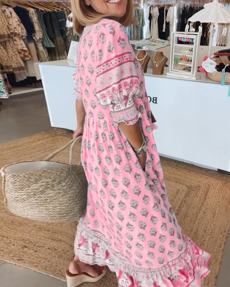 MANA | ROBE FLORALE CHIC MI-LONGUE AVEC ENCOLURE EN V