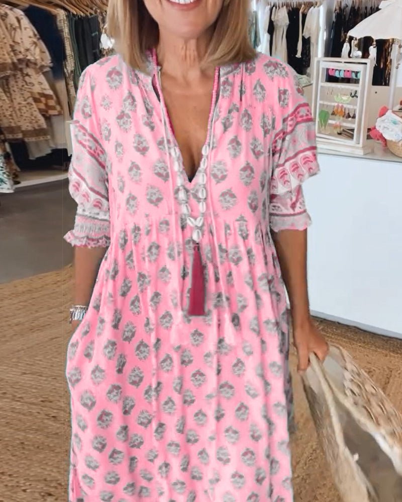 MANA | ROBE FLORALE CHIC MI-LONGUE AVEC ENCOLURE EN V