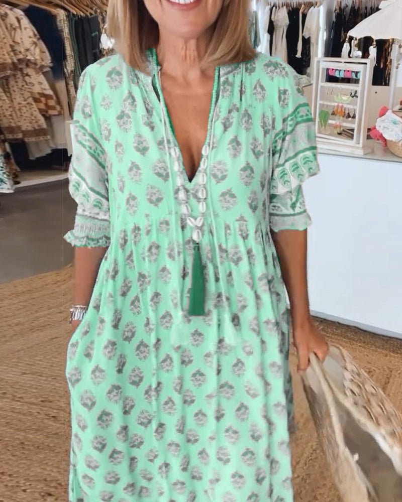 MANA | ROBE FLORALE CHIC MI-LONGUE AVEC ENCOLURE EN V