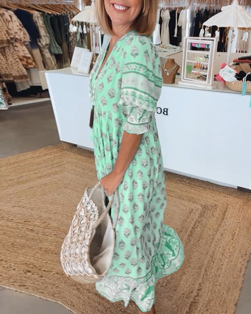 MANA | ROBE FLORALE CHIC MI-LONGUE AVEC ENCOLURE EN V