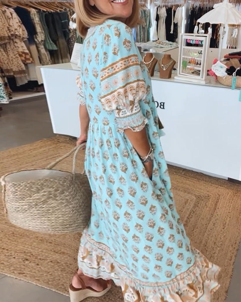 MANA | ROBE FLORALE CHIC MI-LONGUE AVEC ENCOLURE EN V